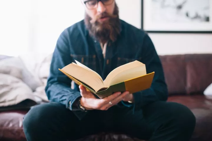 photo of man reading